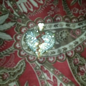 Iced out heart broken pendant